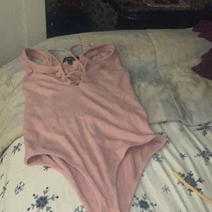 Pink body suit